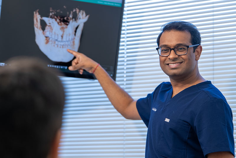 dr pointing at screen